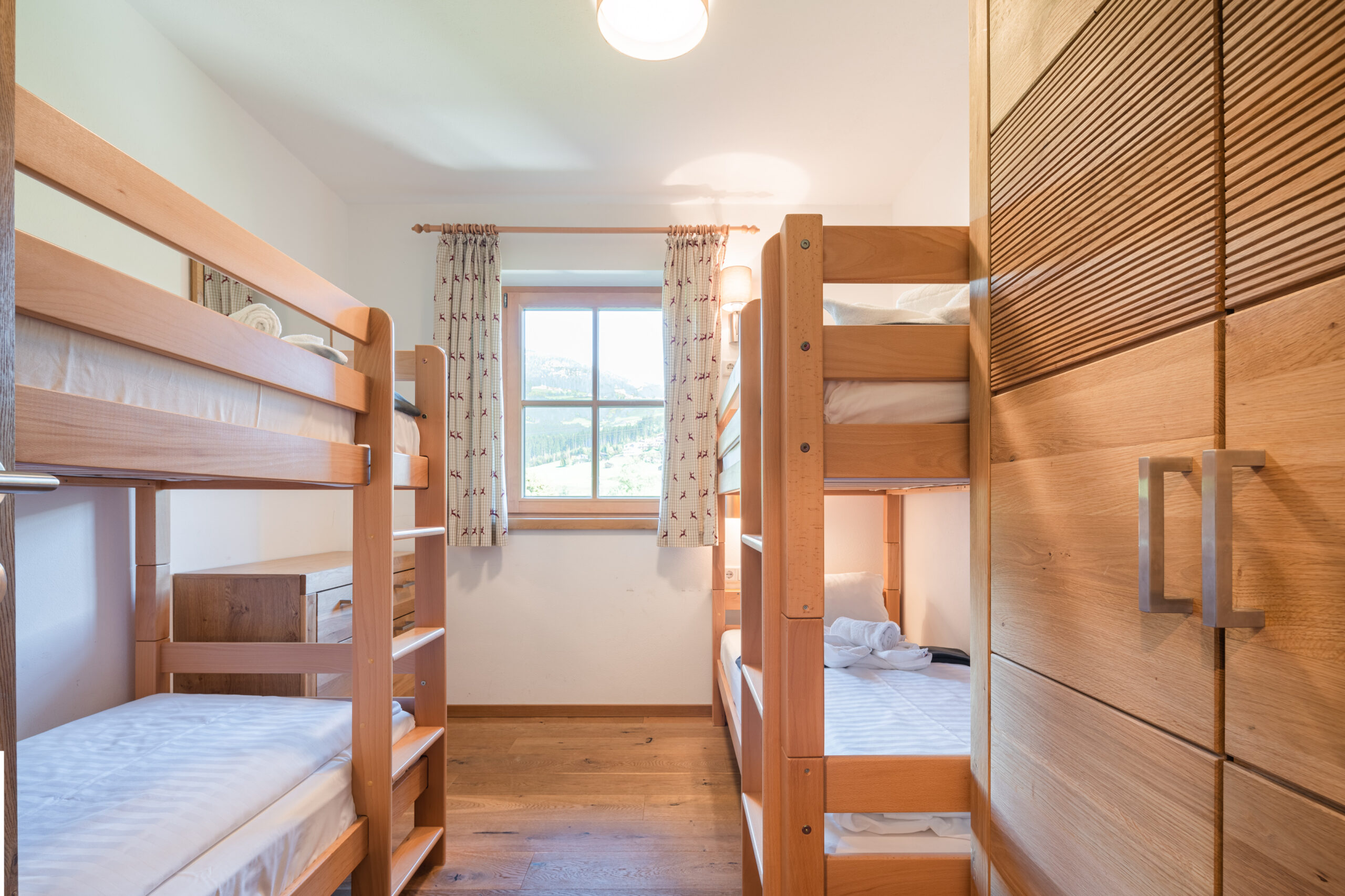 Schlafzimmer Stockbett Top 14 Ferienwohnung in Hollersbach von Alpina Holiday